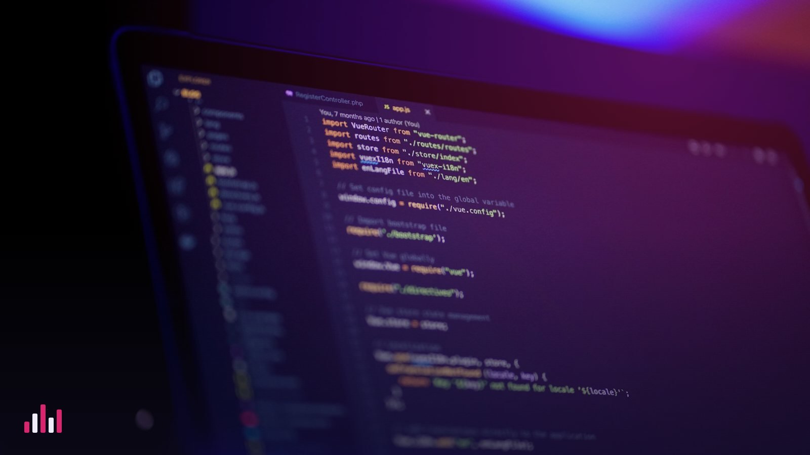 Laptop screen showing code in a dark editor