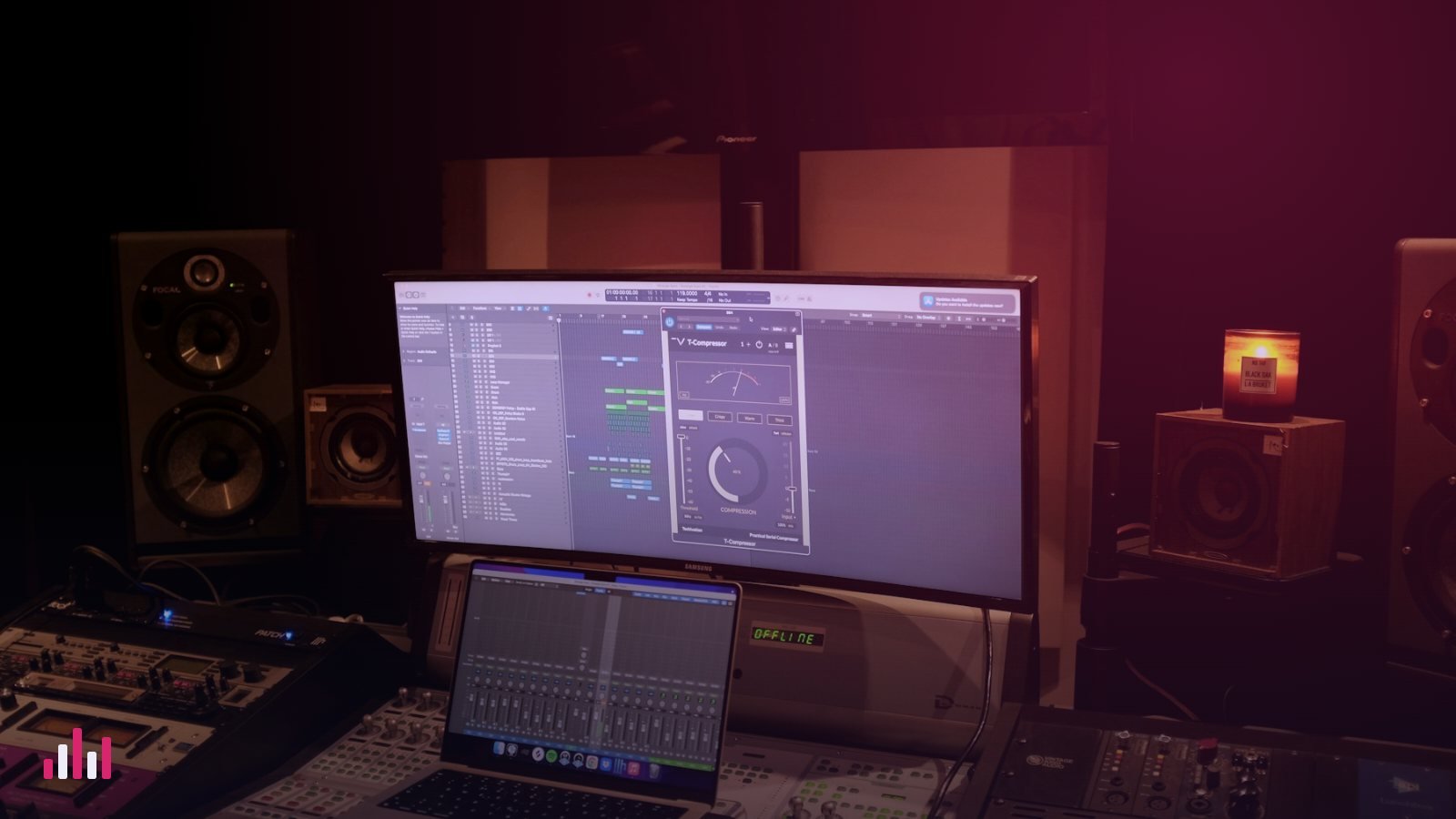 Studio with monitors, a mixing desk and a mastering plugin on screen